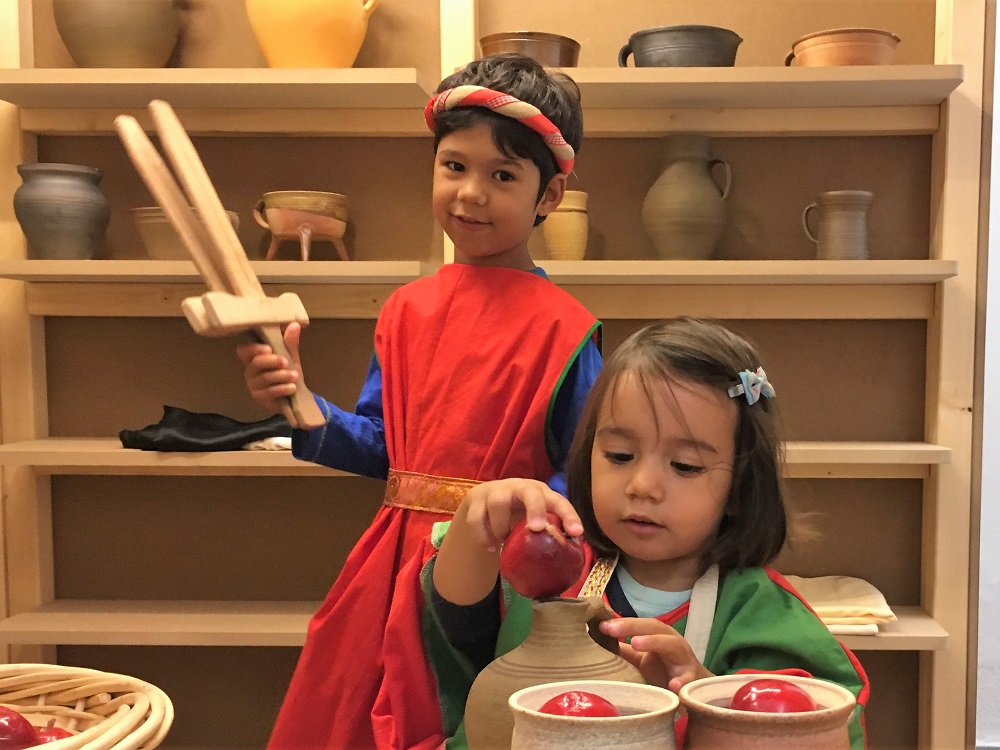 Pretend play at House at the Golden Ring, Prague Old Town Square. 11 indoor activities for kids in Prague, written by a local expat family. 