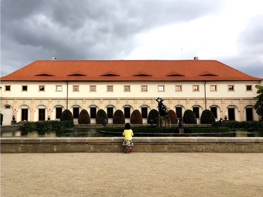 Looking for fish in Wallenstein Gardens, Prague. One of the 74 fun things to do in Prague with kids