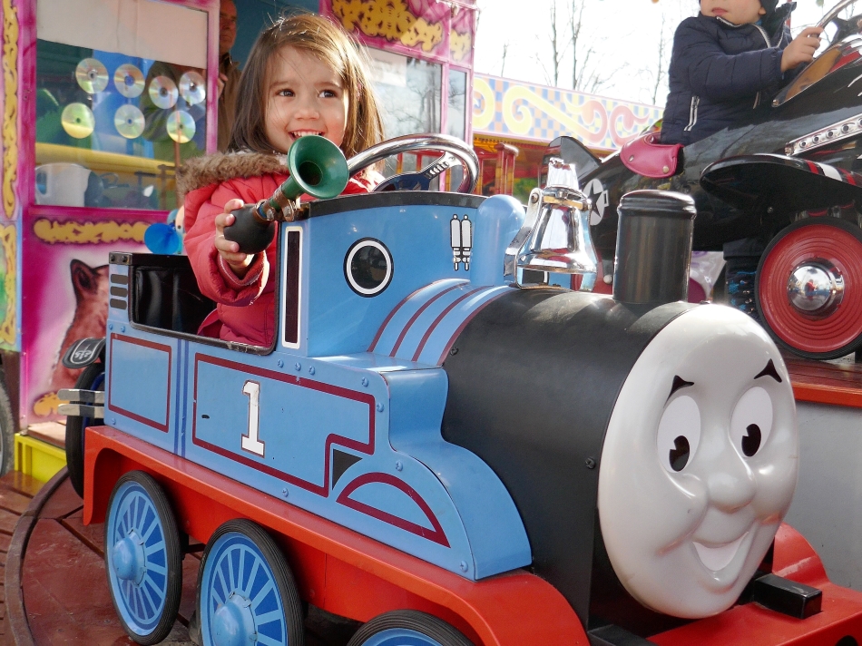 Rides for toddlers at St Matthew's Spring Fair Stromovka Prague