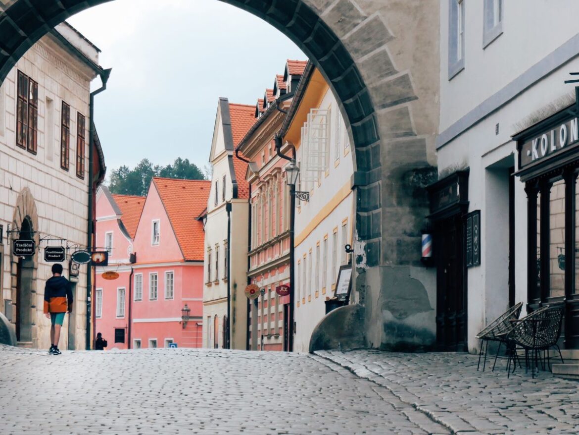 A boy walks through the cobbled centre of Cesky Krumlov - Cesky Krumlov with kids