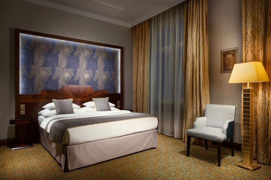 Double room at Hotel Imperial in Prague with muted tones and velvet curtains