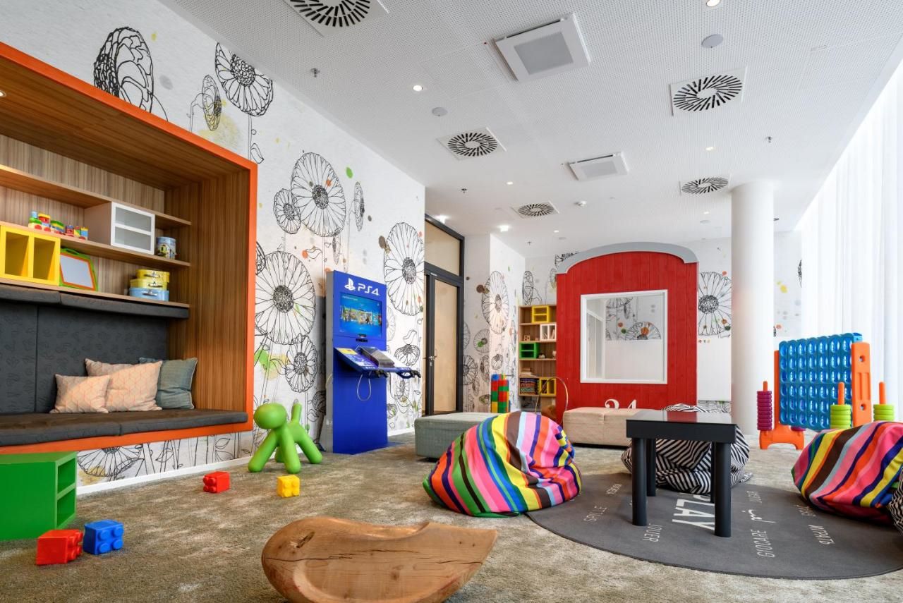 A brightly coloured playroom at Novotel Wien
