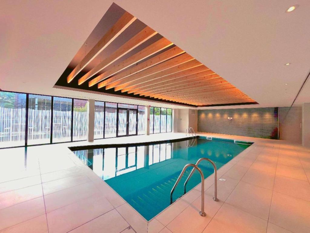 A small indoor swimming pool with enough room for laps and a splash about at Novotel York