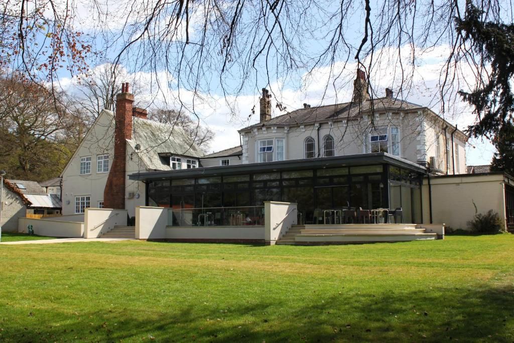 elegant white villa with generous lawned grounds and terrace is now YHA York